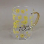 لیوان دسته دار شیشه ای طرح گل زرد